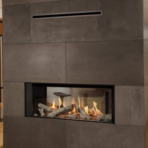 Valor L1 See-through Gas fireplace with driftwood and fluted liner