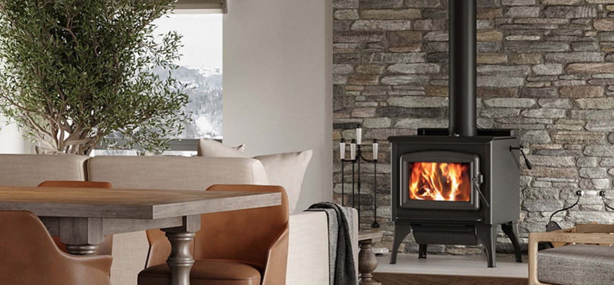 Cozy living room with wood stove - Fireplace store in madison wisconsin